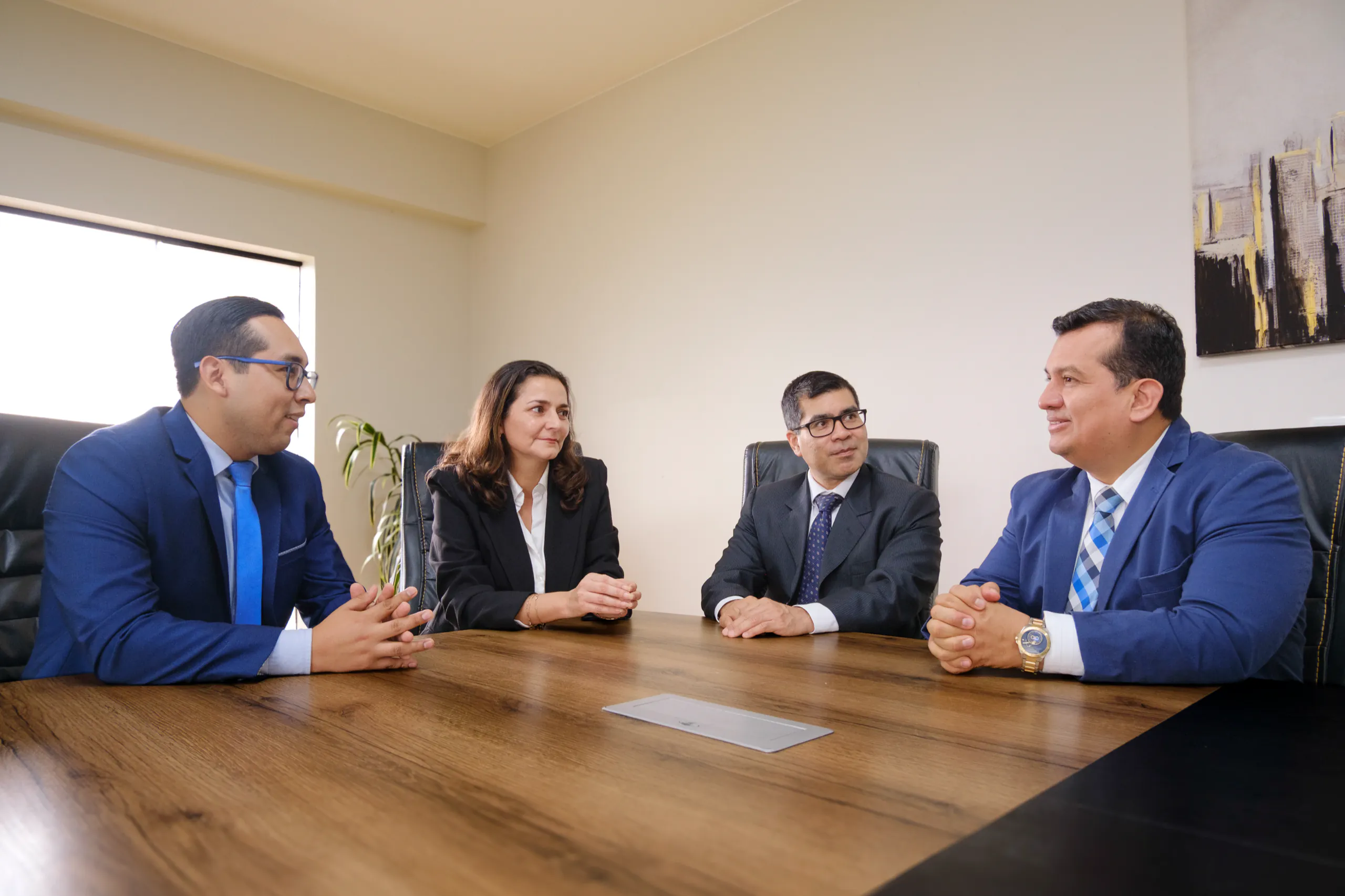 The AD NOVA LEGAL team meeting in the conference room
